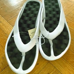 Women White and Black Flip Flops